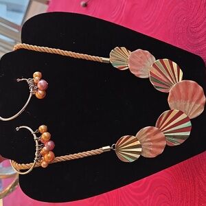 Coral and gold tone necklace